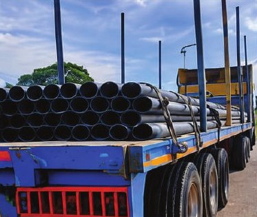 Truck delivering HDPE pipes