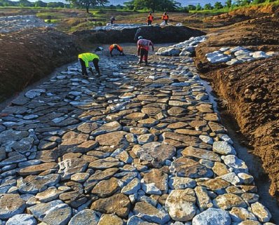Stone pitching on the spring source channel
